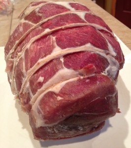 I take the tied leg of lamb out of the freezer, and let thaw naturally.  I cut all the fat off shaving it as I can