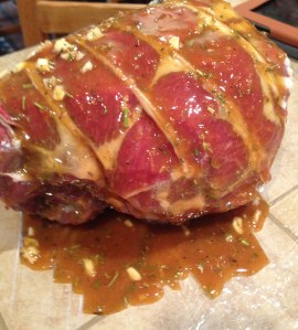 I lay plastic saran wrap down and set lamb on top and pour my marinade on then wrap and set in fridge