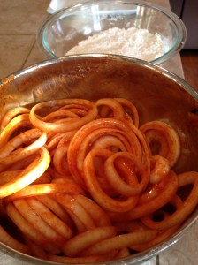 I pour half of a Tapatio bottle over my onion rings and let them sit for 30 minutes.