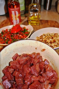 Cut your tuna in smaller portions than I did in this photo.  Dice it.  