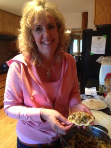 Here is Shery diligently working while her team is sitting at the table discussing diamonds or something.