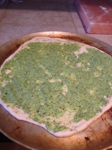 Lay down the sauce on your pizza pie