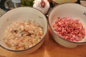 Onions are golden brown, bacon is ready for later.