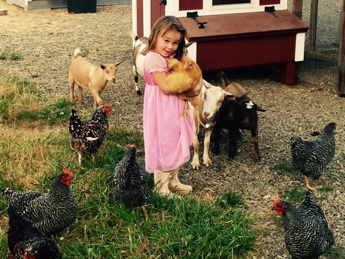 Mady and her chickens, she is holding her favorite....DUCKY.